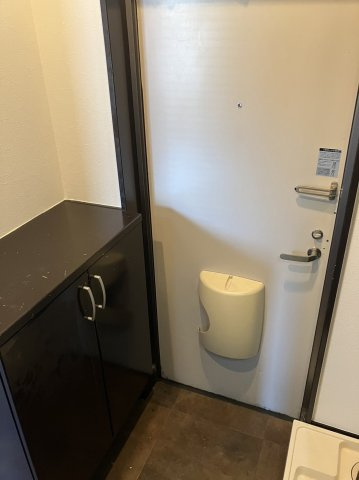 川崎市多摩区西生田５丁目のアパートの玄関