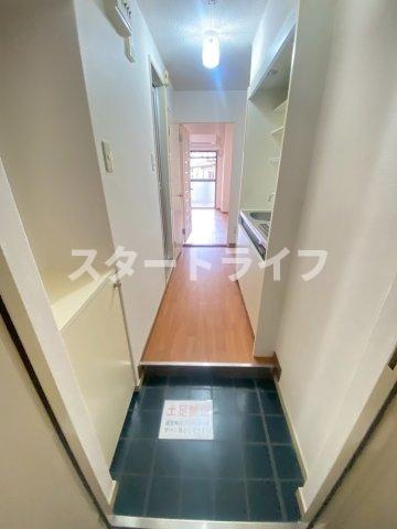 大阪市東淀川区下新庄３丁目の賃貸マンションの玄関