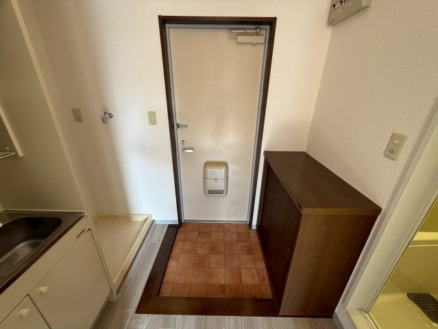 メゾンユーガの玄関