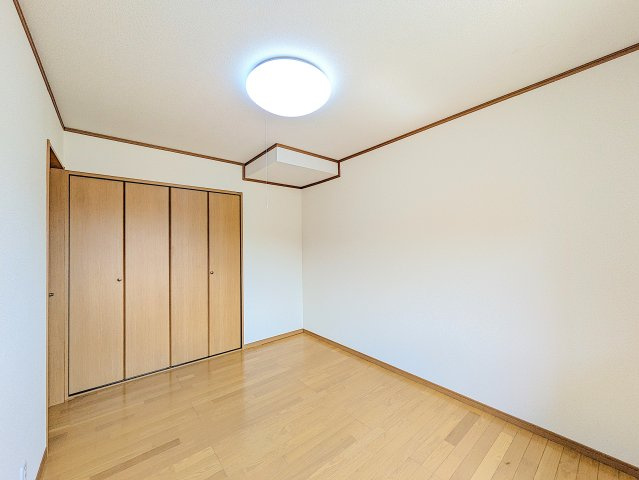 Ｍハイツ新島町の洋室