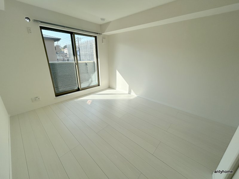 プルメリア関大前　仲介手数料無料の寝室