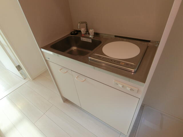 調布市富士見町４丁目のアパートのキッチン