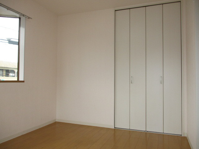 シャルム星和台の寝室