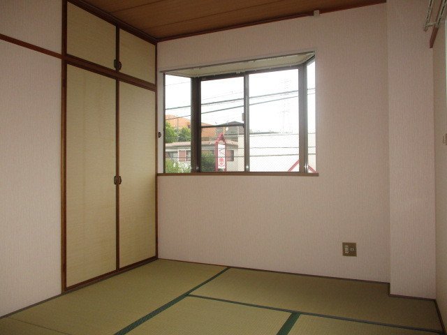 シャルム星和台の寝室