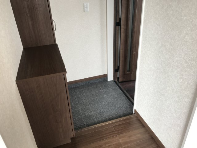 星が浦大通1テラスハウスAの玄関