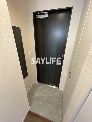 Maison Genjigaoka（メゾン ゲンジガオカ）の玄関