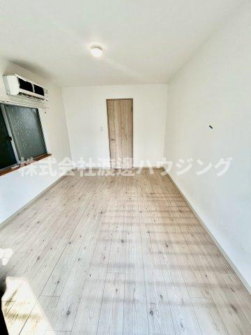 大阪市淀川区木川西３丁目のテラスの洋室