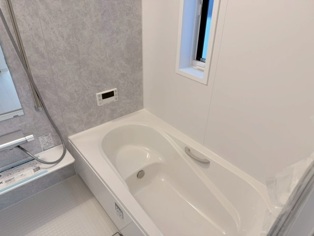 川越市氷川町　新築一戸建て　A号棟の浴室|落ち着いた空間のお風呂です