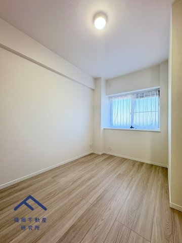 コアマンション博多南の洋室