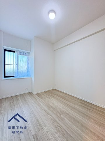 コアマンション博多南の洋室