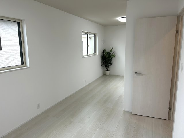 阿賀野市保田≪CUSMO川原田≫の洋室