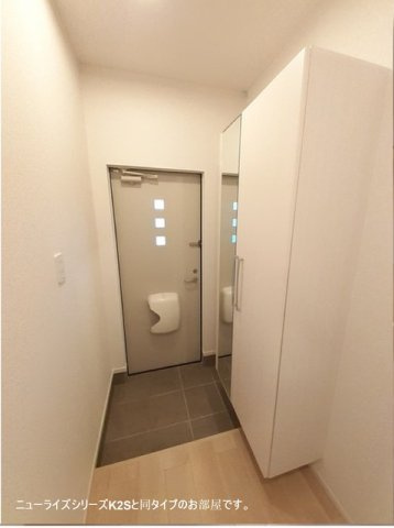 グランソレイユ城山の玄関