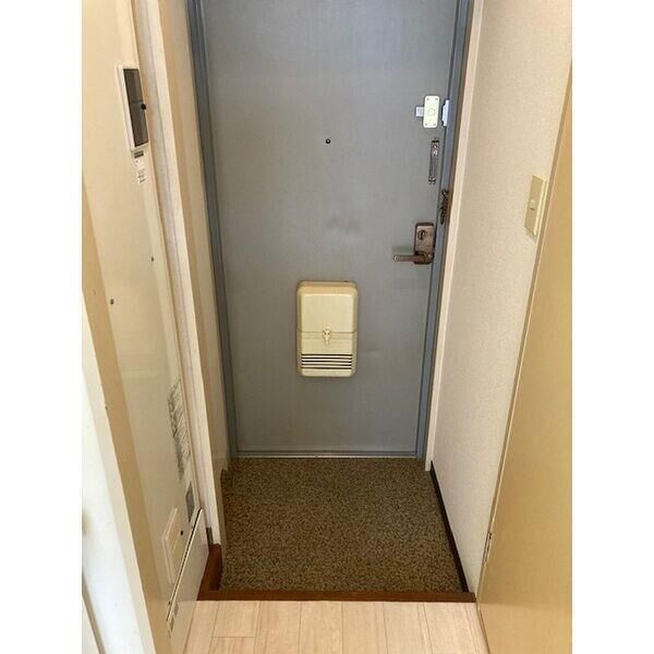 カーサ王塚台の玄関