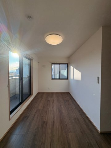 グランソフィア廻田町の洋室