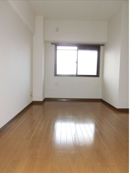 エアーシャトー六田の寝室