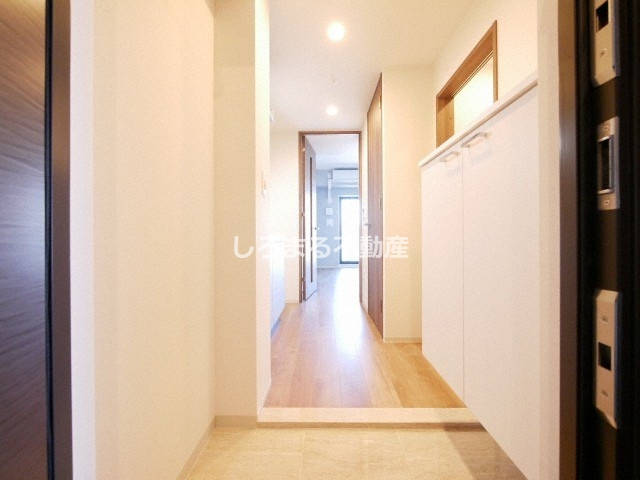レジュールアッシュ天王寺舟橋の玄関