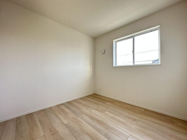 明石市大久保町松陰新築戸建１号棟の洋室