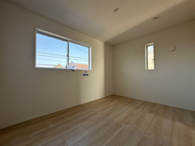 明石市大久保町松陰新築戸建１号棟の洋室