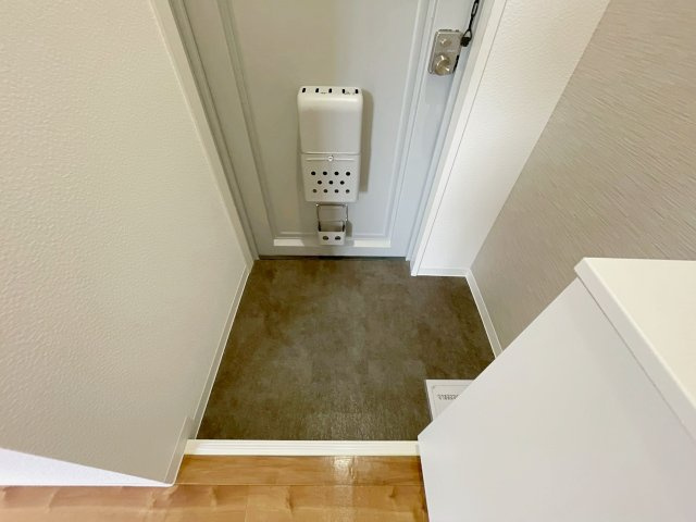 光マンションの玄関