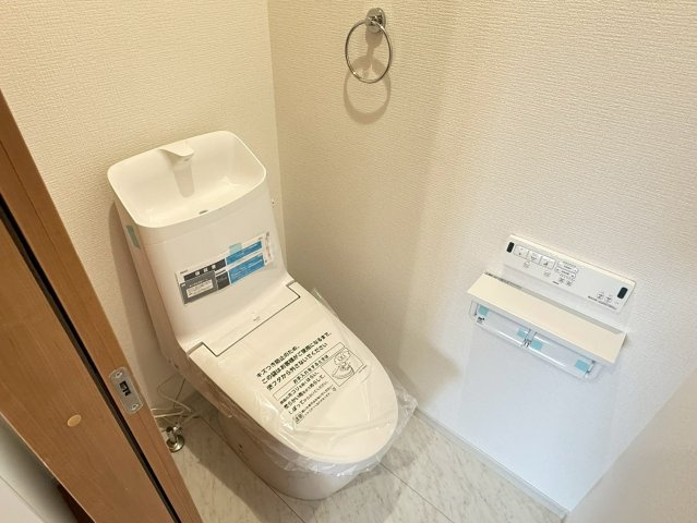 川越市南大塚4丁目　新築一戸建て　12号棟のトイレ|落ち着いた色調のトイレです