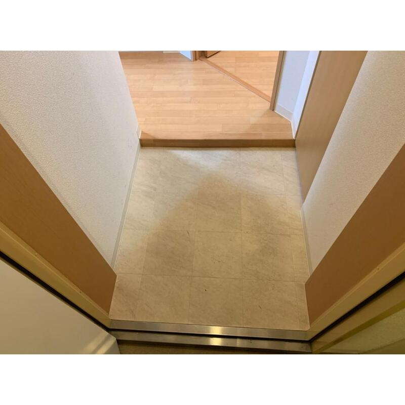 リタコートの玄関