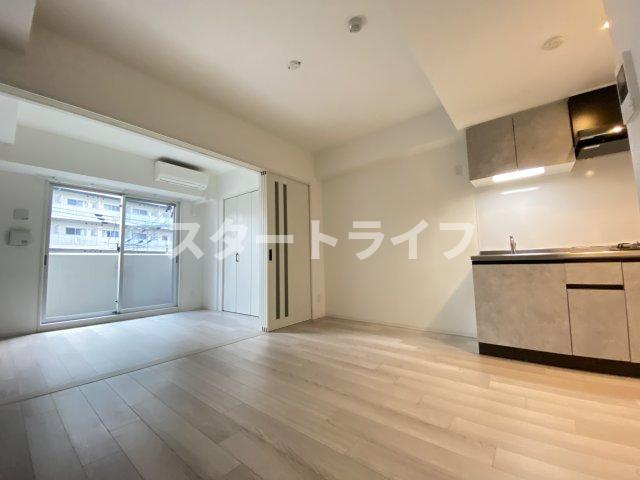 大阪市淀川区西中島１丁目の賃貸マンションの居間・リビング