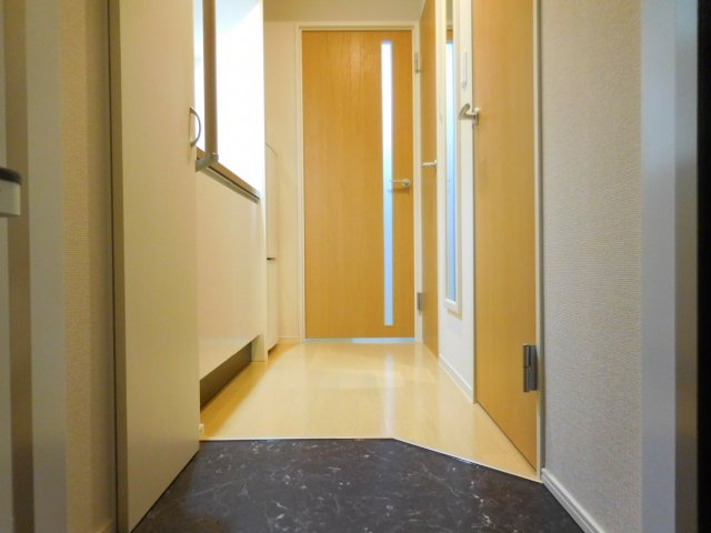 クレイノサウザンドリバーの玄関