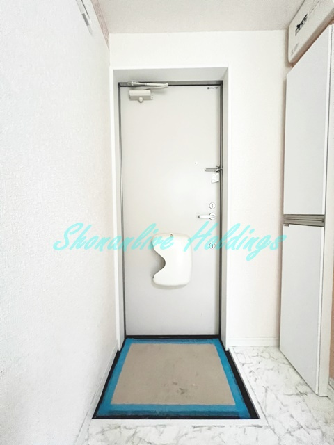 ユナイト田浦パルタージュの玄関