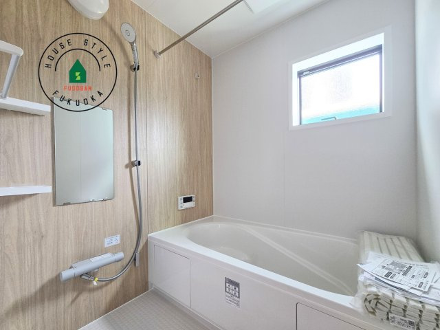 福岡市南区井尻4丁目第1-2棟（2号棟）の内観：施工例|1日の疲れを癒してくれる広々バスルーム。雨の日のお洗濯にも大活躍な浴室乾燥機付です！