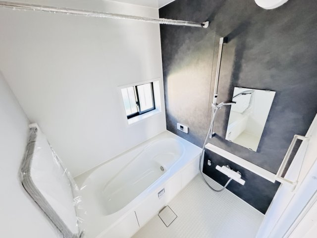 柏市南増尾３丁目新築戸建【土南部小学校：8分】の浴室|手元で水流切り替えシャワーヘッド