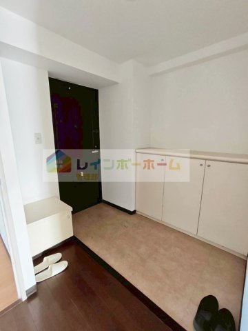 コープ野村志木の玄関