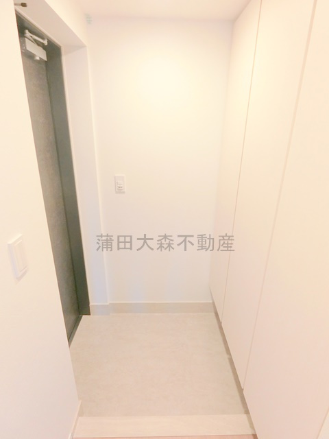 スタイリオ池上WeLLの玄関