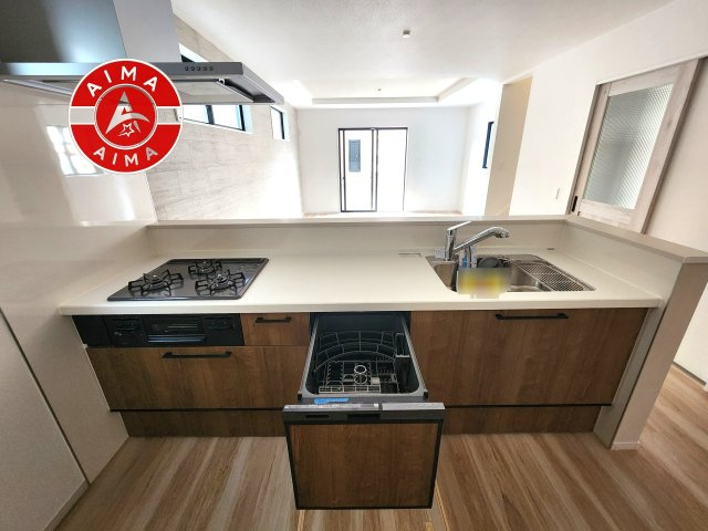 太宰府市朱雀4丁目第4-2棟（1号棟）　の内観：施工例|ご家族を近くに感じられる対面キッチンのLDK。会話もはずみそうですね。