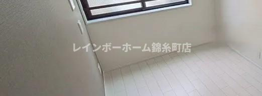 プレミアム梅島駅前の居間・リビング