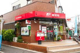 足立佐野郵便局まで591m