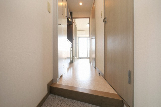 大阪市西区本田３丁目の賃貸マンションの玄関