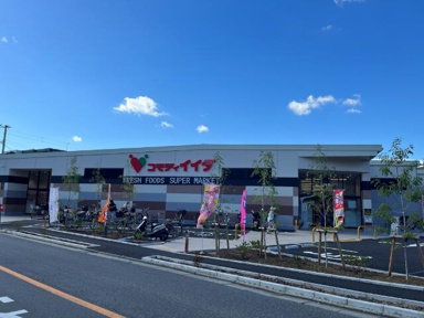 コモディイイダ　鹿浜店まで212m