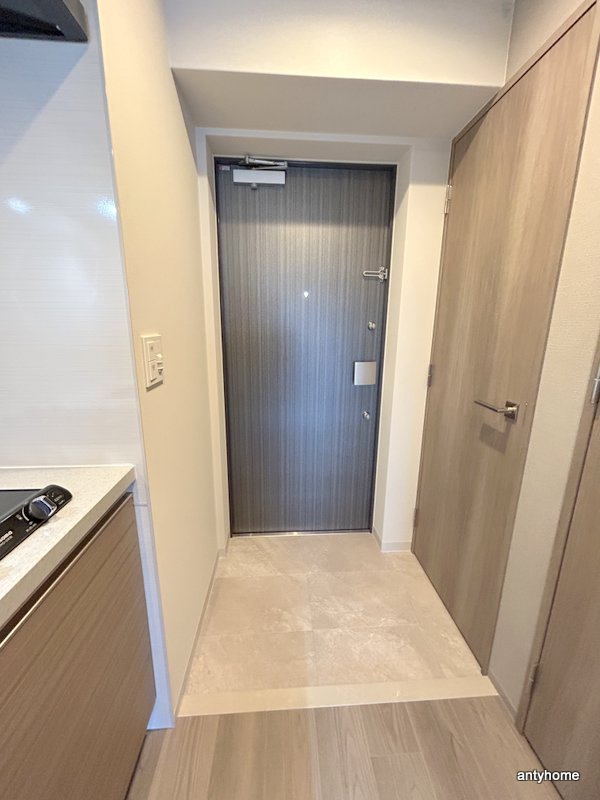 ファーストフィオーレ江坂ラディール　仲介手数料無料の玄関