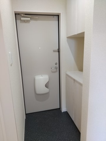 ルミエールGの玄関