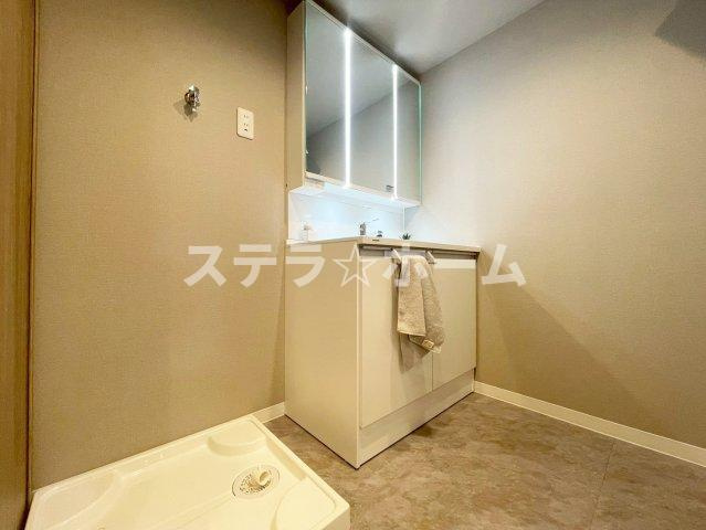 リバーサイドともぶち第一住宅14号棟のランドリースペース