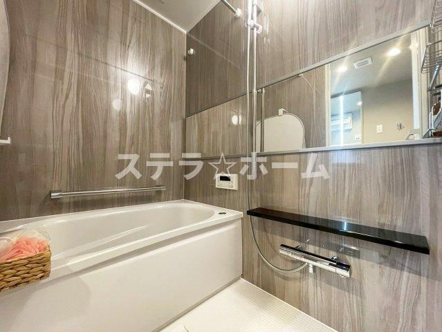 リバーサイドともぶち第一住宅14号棟の浴室|落ち着いた空間のお風呂です