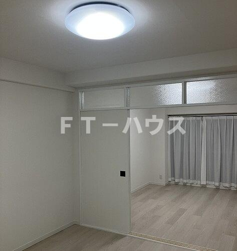 ソフトタウンニュー谷津遊園の居間・リビング|リビング・キッチン　内装後