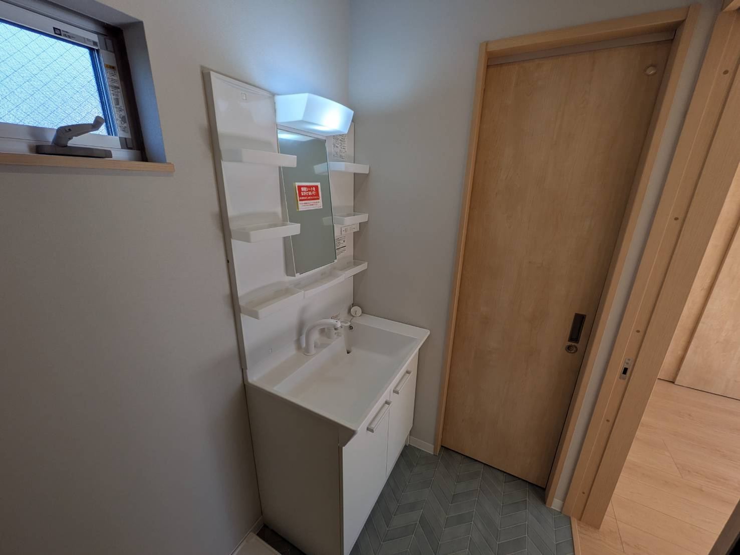 シャルム魚住の洗面所