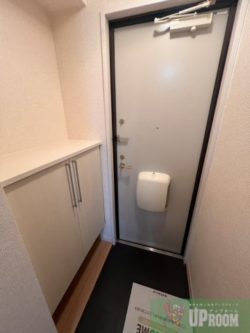 寄京南ハイツの玄関