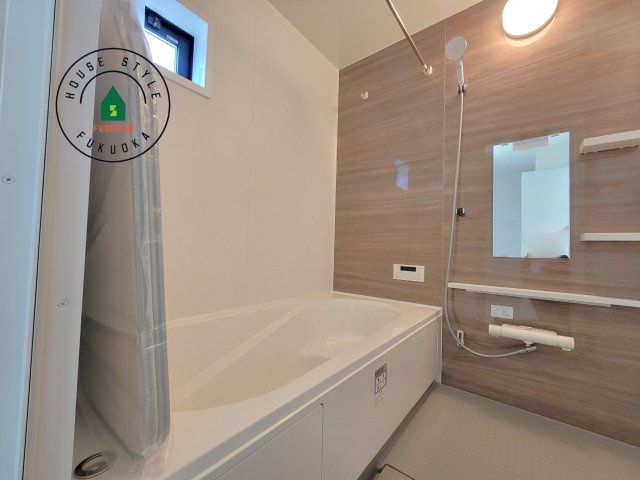 福岡市東区香椎駅東１丁目第4-1棟（１号棟）の内観：施工例|1日の疲れを癒してくれる広々バスルーム。雨の日のお洗濯にも大活躍な浴室乾燥機付です！