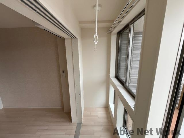 高尾崎 NEW TOWN　La・Terre Hのバルコニー|サンルーム