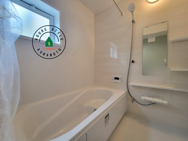 合志市豊岡第4-1棟(1号棟)の内観：施工例|1日の疲れを癒してくれる広々バスルーム。雨の日のお洗濯にも大活躍な浴室乾燥機付です！