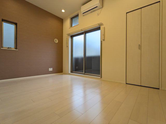 ハーモニーテラス生駒町Ⅱの居間・リビング