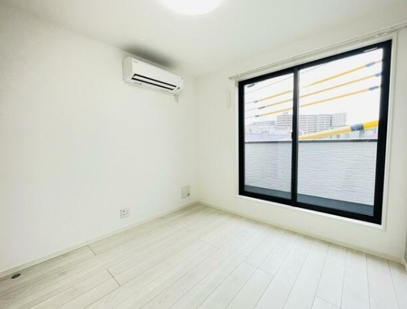 プルミア梅島の居間・リビング