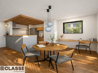 【内装】 | 宇治市木幡北山畑　新築戸建 | 下がり天井が映えるキッチンに、2か所のパントリーで収納力を確保。
生活感を出さずに片づき、手元を照らす照明で毎日の家事がスムーズに進みます。